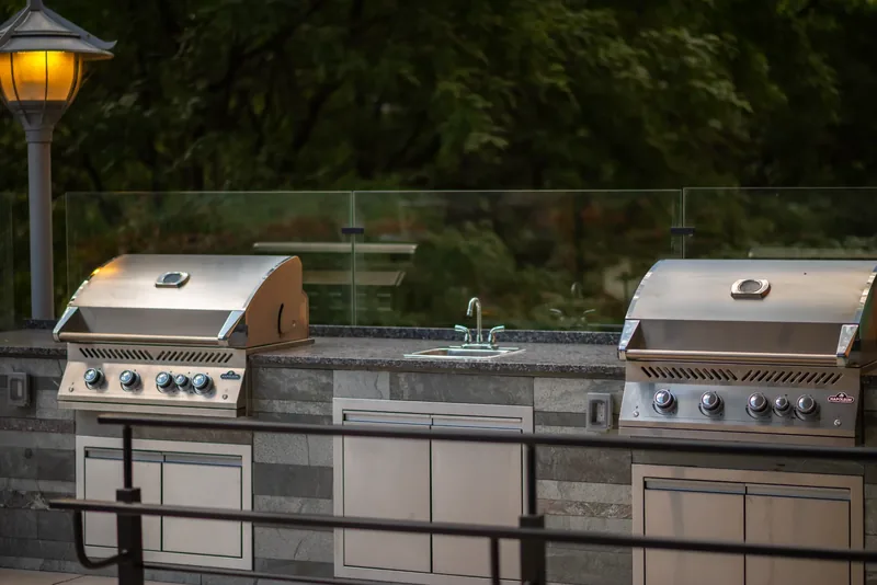Outdoor kitchen with built-in grills on the terrace