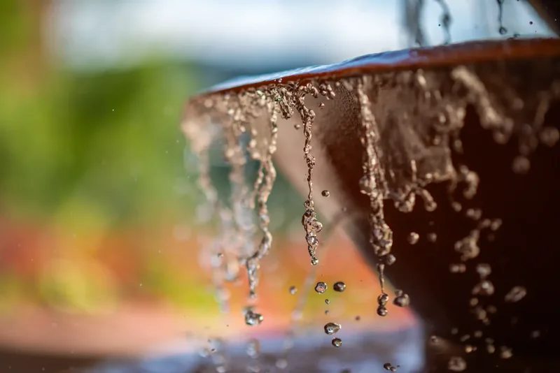 Close-up of water falling from the terrace fountain