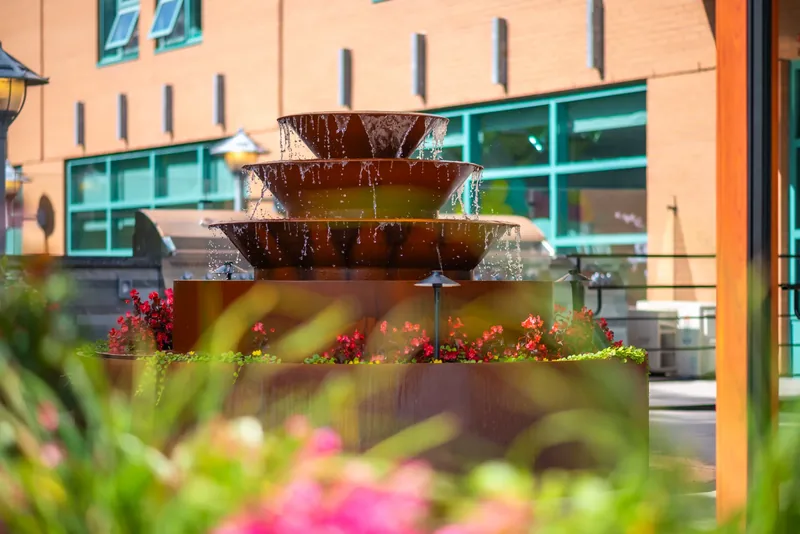 Tiered steel fountain on the terrace