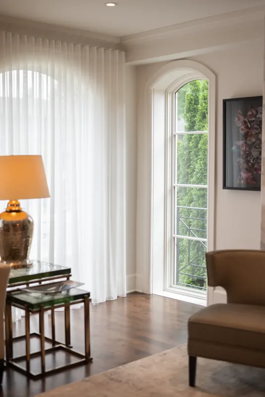 Reading corner beside an arched window