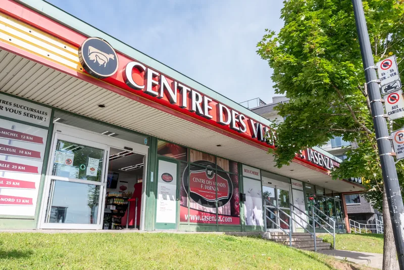 Iasenza store in a shopping centre with a long illuminated red sign, a glass entrance, and a sign listing the other branches