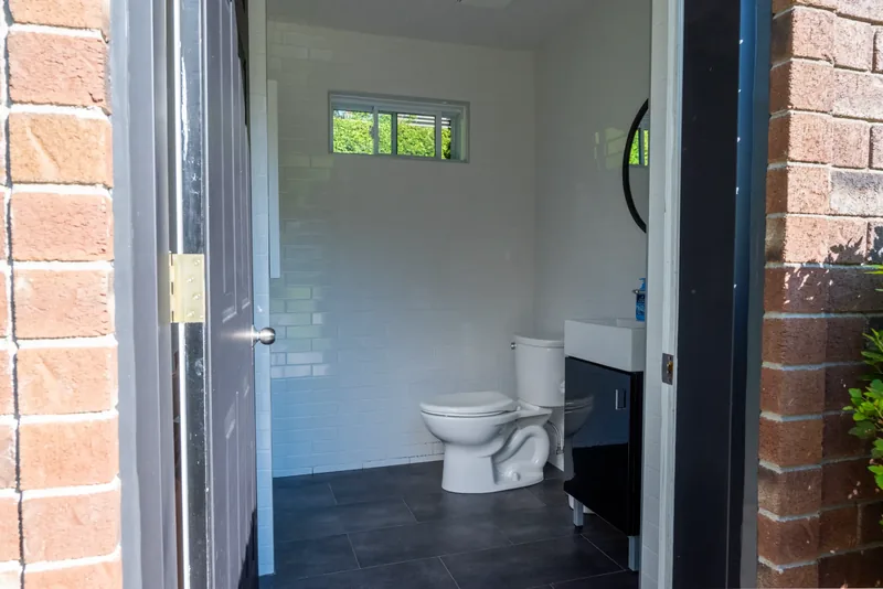 Washroom inside the brick garden pavilion