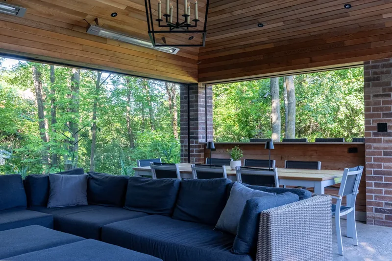 Sectional lounge in the pavilion, open to the trees