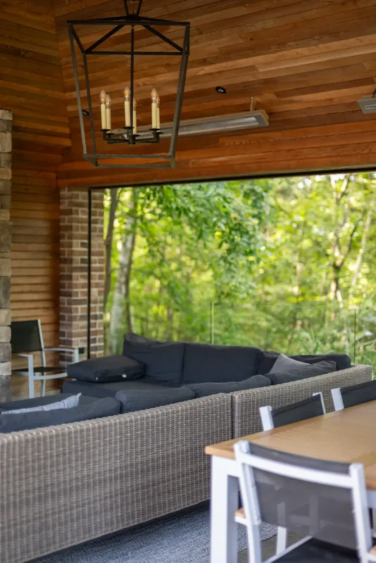 Sectional lounge in the pavilion, open to the trees